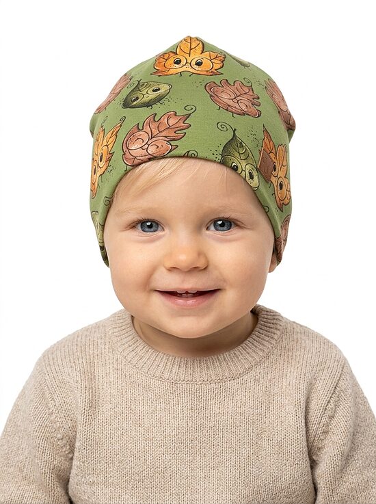Starpsezonas Beanie cepure 1-2 gadi, krāsainas lapas uz zaļa fona